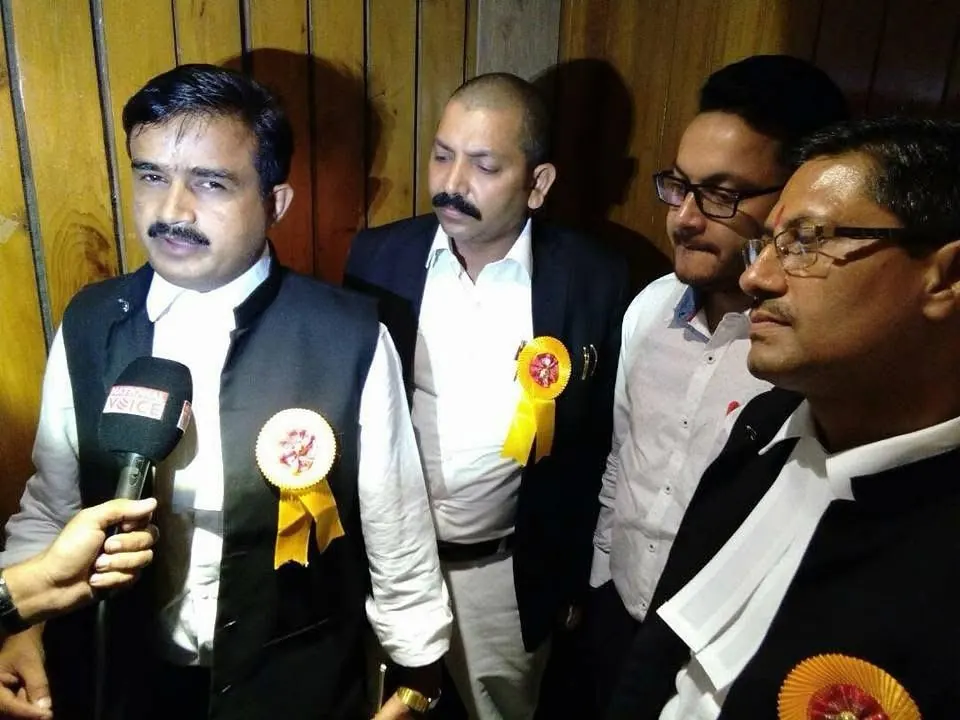 Adv. Nitin Yadav speaking to the press