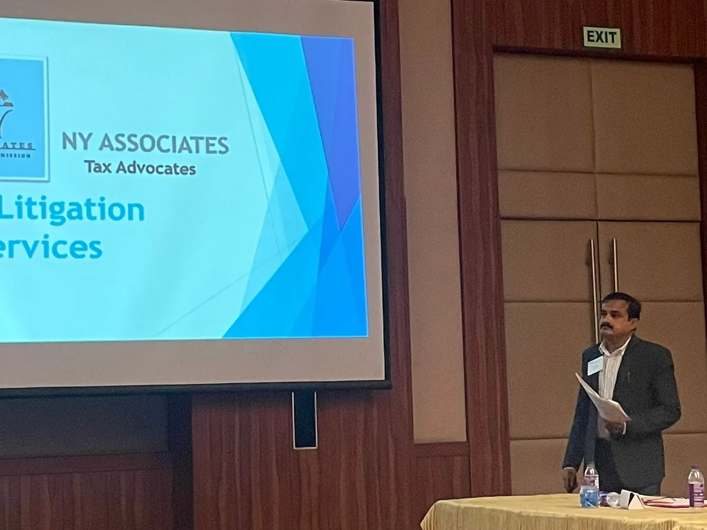Adv. Nitin Yadav presenting on litigation services